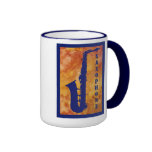 Saxofón en el naranja taza de café