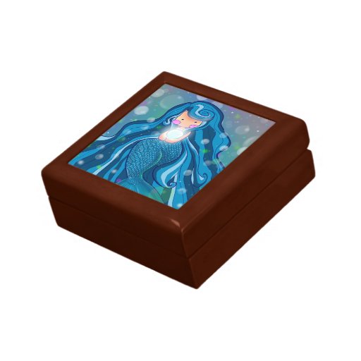 Sirena con la gran caja de regalo de la perla bril