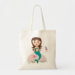 Sirena linda que se sienta en una roca con el bols bolsas lienzo