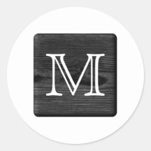 Su monograma de la letra. Imagen de la madera negr Etiquetas Redondas