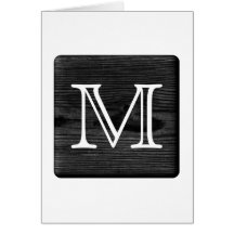 Su monograma de la letra. Imagen de la madera negr Felicitacion