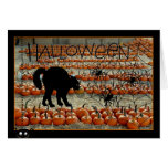 Tarjeta de Halloween con el gato negro