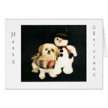 Tarjeta de Navidad con el perro y el muñeco de nie