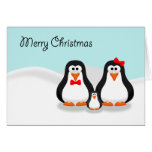Tarjeta de Navidad linda de la familia del pingüin