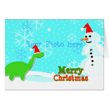 Tarjeta linda del muñeco de nieve del dinosaurio d