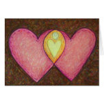 Tarjeta rosada de dos corazones