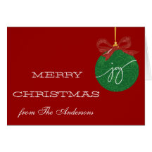 Tarjeta verde roja de las Felices Navidad del orna