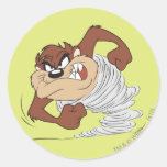 Taz que hace girar rápidamente pegatina redonda