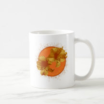 Taza anaranjada de la flor