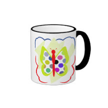 Taza artsy de la mariposa del lunar