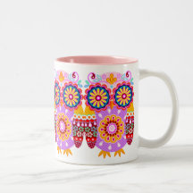 Taza colorida de los búhos