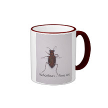 Taza con un insecto del escarabajo