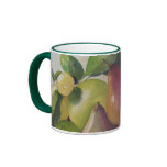 TAZA con vida de las manzanas y todavía de las per tazas