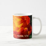 Taza de café color de rosa anaranjada de la OFICIN