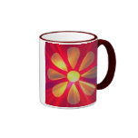 Taza de café de oro de la flor