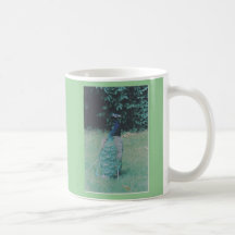 Taza de café del pavo real