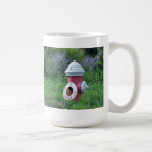 Taza de café fuera de servicio de la boca de riego