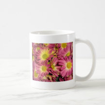 Taza de café rosada de las momias