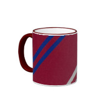 Taza de cerámica de la materia textil rayada de la