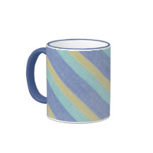 Taza de cerámica de la materia textil rayada del v
