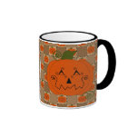 Taza de la calabaza del remiendo de Halloween