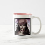 Taza de la cara de la muñeca