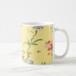 Taza de los pescados del oro