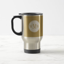 Taza de oro del monograma de la tela a rayas