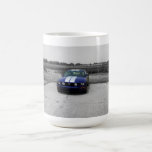 Taza del azul del coche del músculo