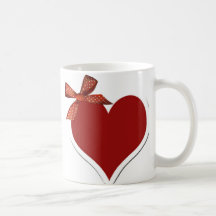 Taza del corazón y de la cinta