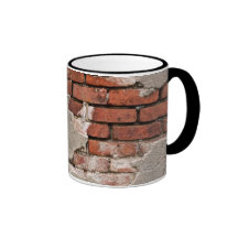 Taza del hormigón y de la pared de ladrillo