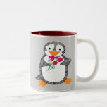 Taza del pingüino del damasco