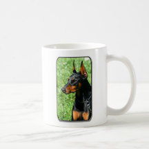 Taza del Pinscher del Doberman