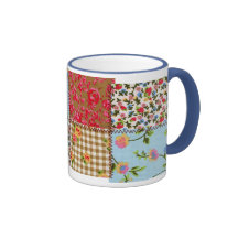 Taza floral del modelo del remiendo de la tela