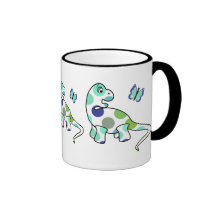 Taza linda del dinosaurio del lunar