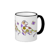 Taza linda del dinosaurio del lunar