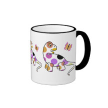 Taza linda del dinosaurio del lunar