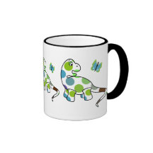 Taza linda del dinosaurio del lunar