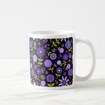 Taza púrpura de las flores