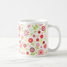 Taza roja de las flores