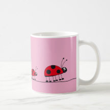 taza rosada de la mariquita
