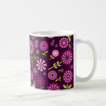 Taza rosada de las flores