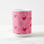 Taza rosada de los corazones