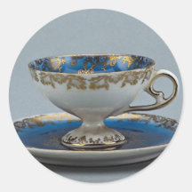 Taza y platillo con diseños coloridos etiqueta