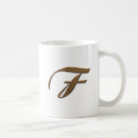 Tazas decorativas del monograma del oro