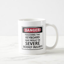 Teclado del peligro tazas de café