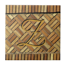 Teja - pared de ladrillo con el monograma