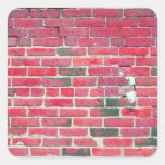 Textura roja brillante de la pared de ladrillo del colcomanias cuadradas