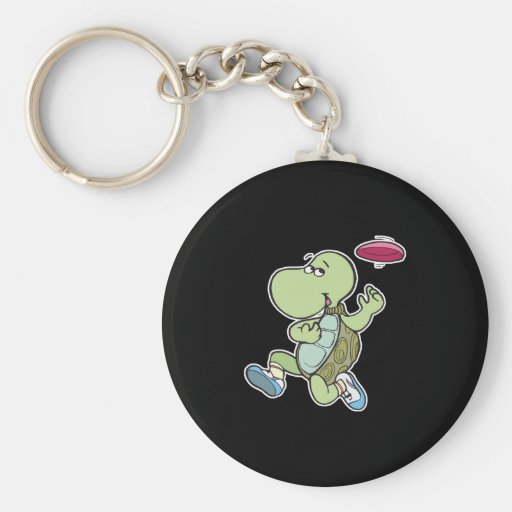 tortuga que juega el disco volador llavero
