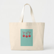 Tres chucherías del navidad con las estrellas bolsa de mano